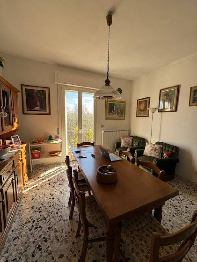 Ingrandisci la foto