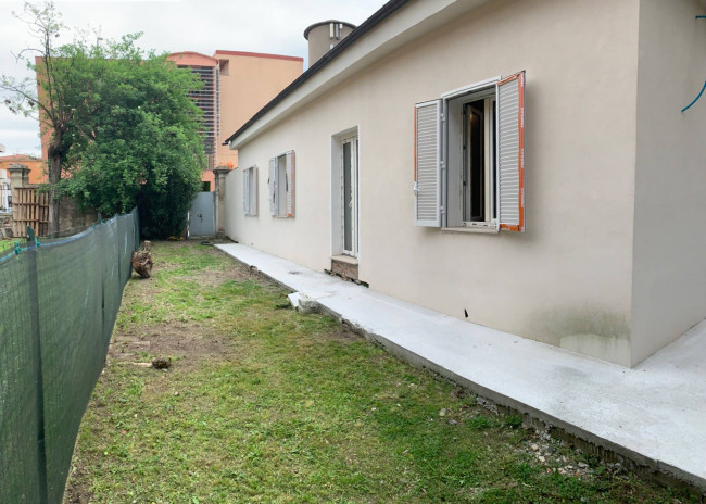 Ingrandisci la foto