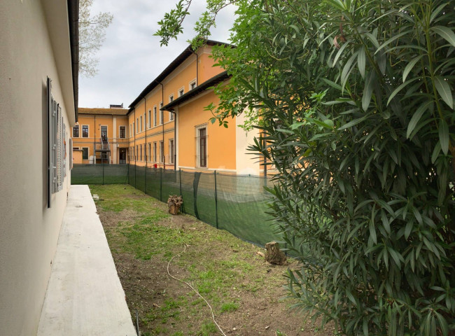 Ingrandisci la foto