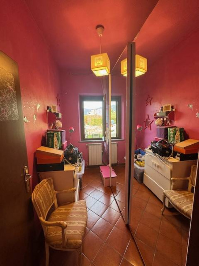 Ingrandisci la foto