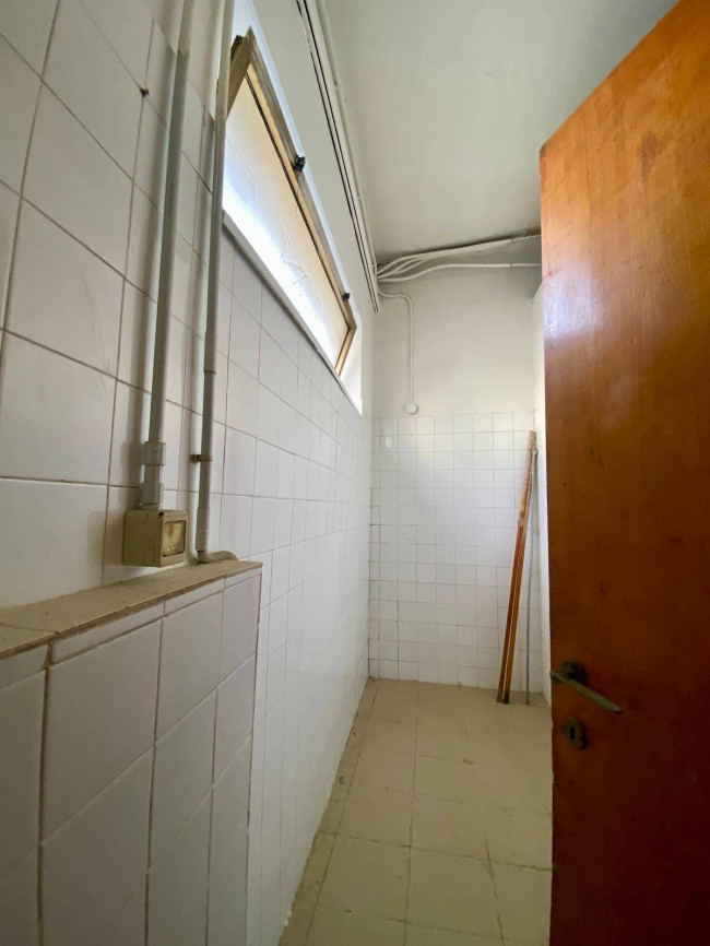 Ingrandisci la foto