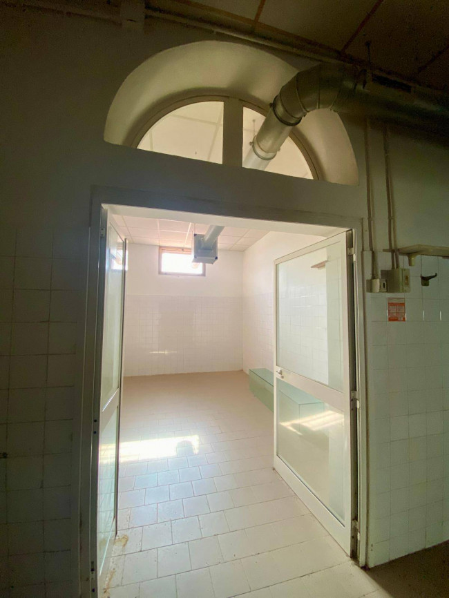 Ingrandisci la foto