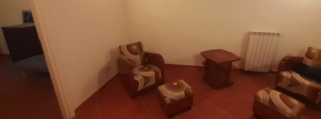 Ingrandisci la foto