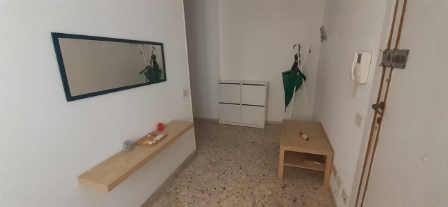 Ingrandisci la foto