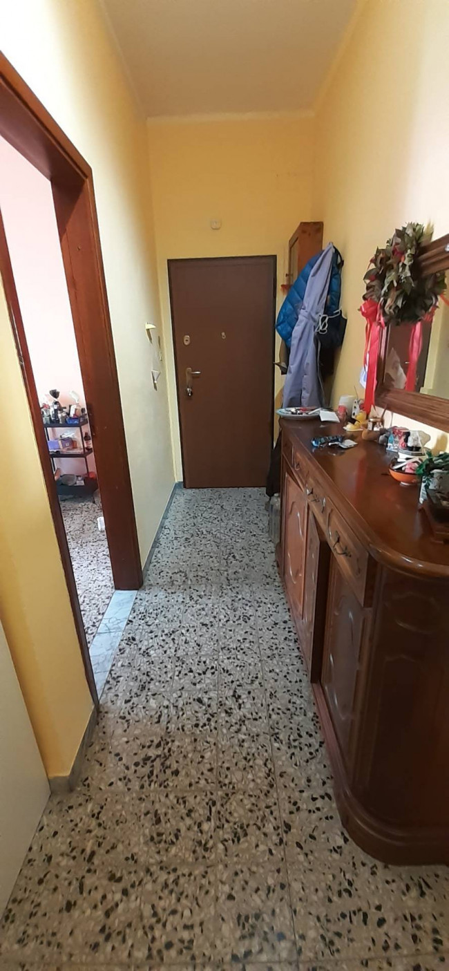Ingrandisci la foto