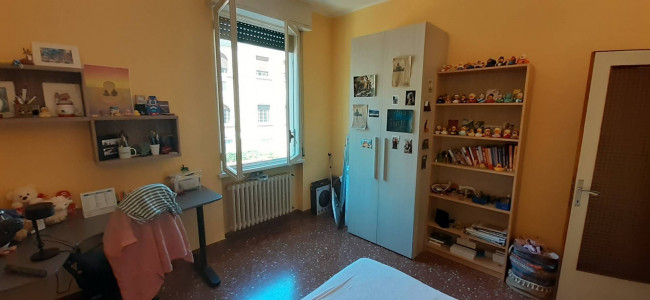 Ingrandisci la foto