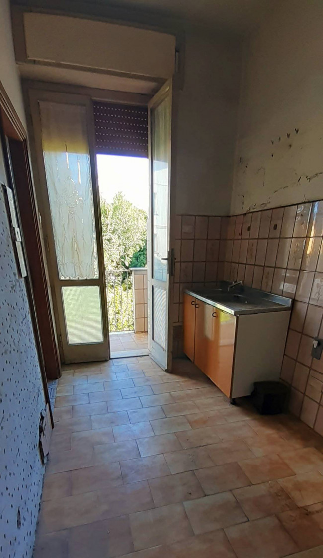 Ingrandisci la foto