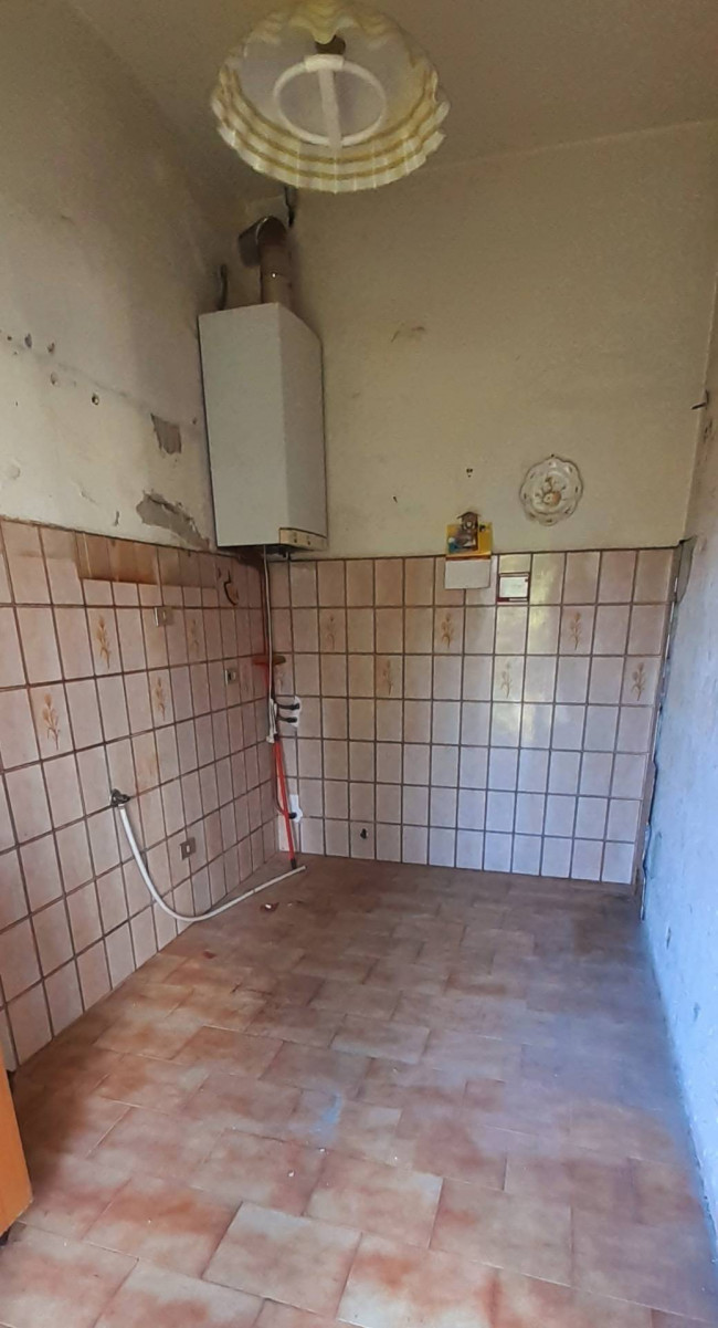Ingrandisci la foto