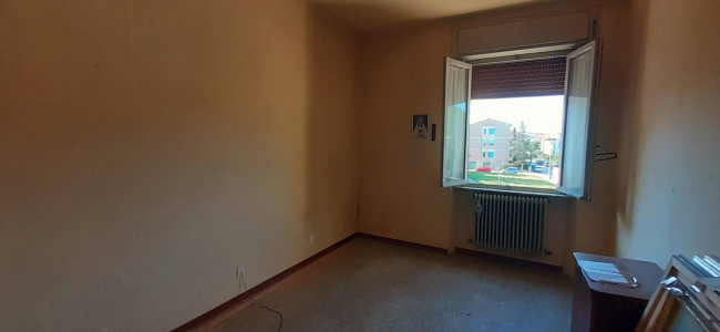Ingrandisci la foto