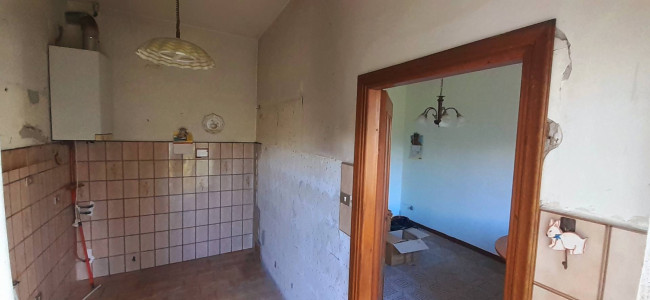 Ingrandisci la foto