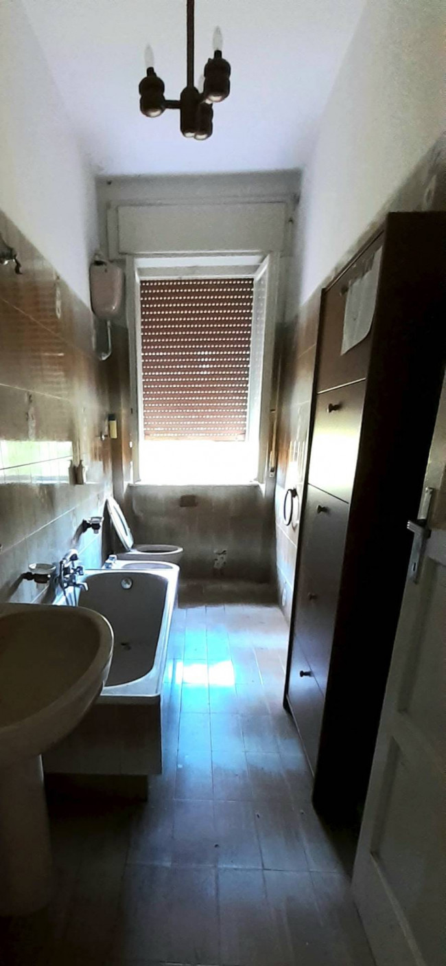 Ingrandisci la foto