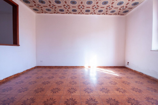 Ingrandisci la foto