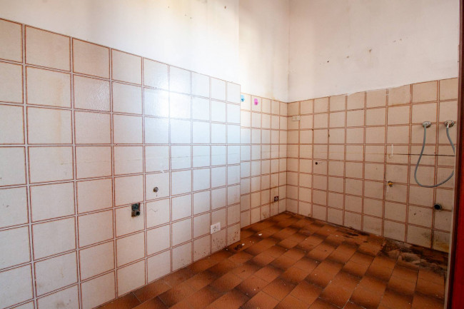 Ingrandisci la foto
