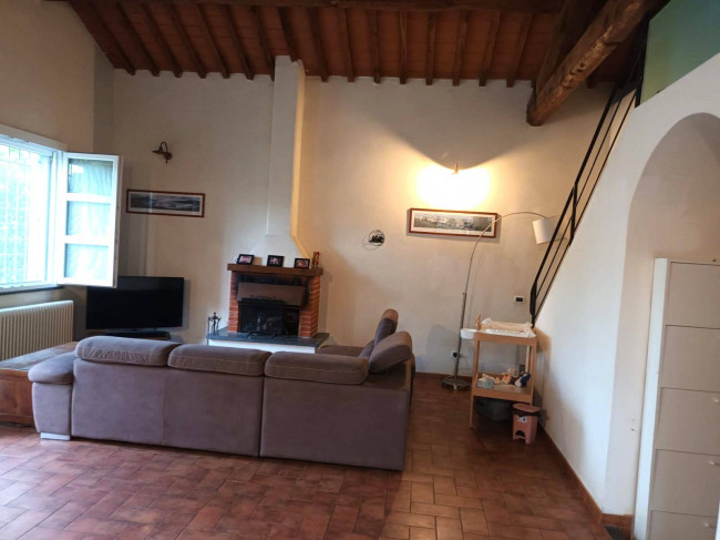 Ingrandisci la foto