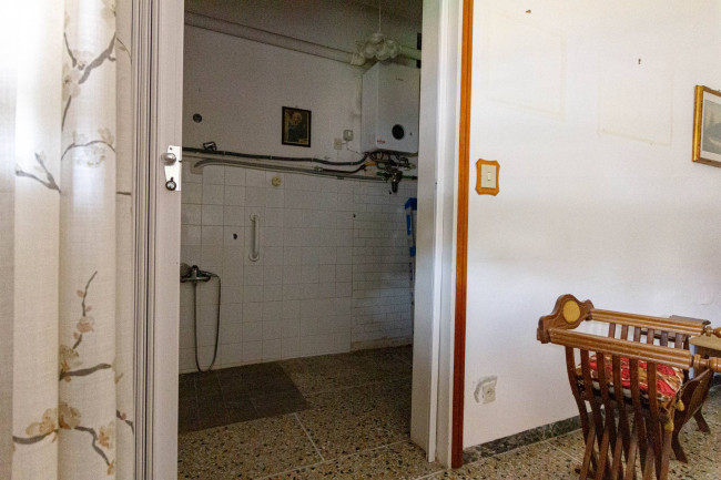 Ingrandisci la foto