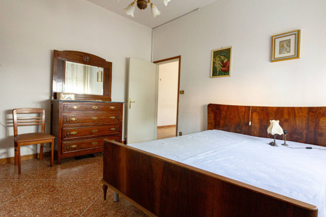 Ingrandisci la foto