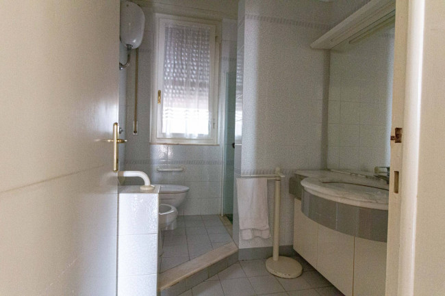 Ingrandisci la foto
