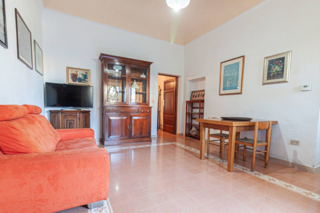 Ingrandisci la foto