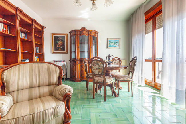 Ingrandisci la foto
