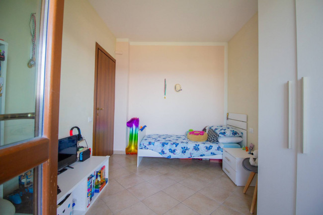 Ingrandisci la foto