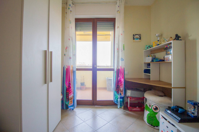 Ingrandisci la foto