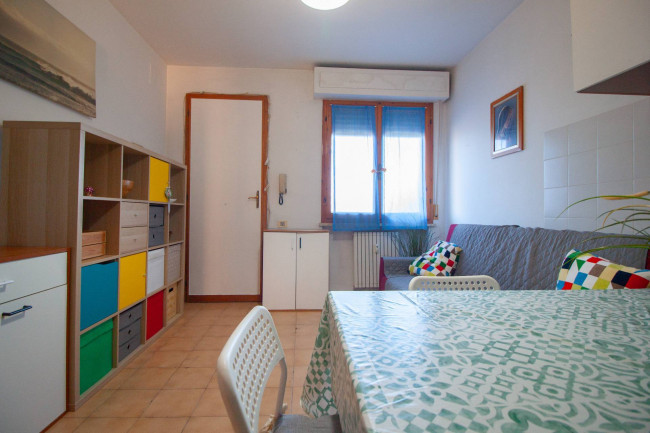 Ingrandisci la foto