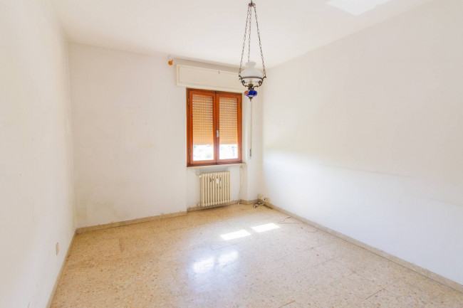 Ingrandisci la foto
