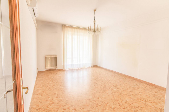 Ingrandisci la foto