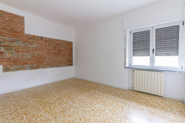 Ingrandisci la foto