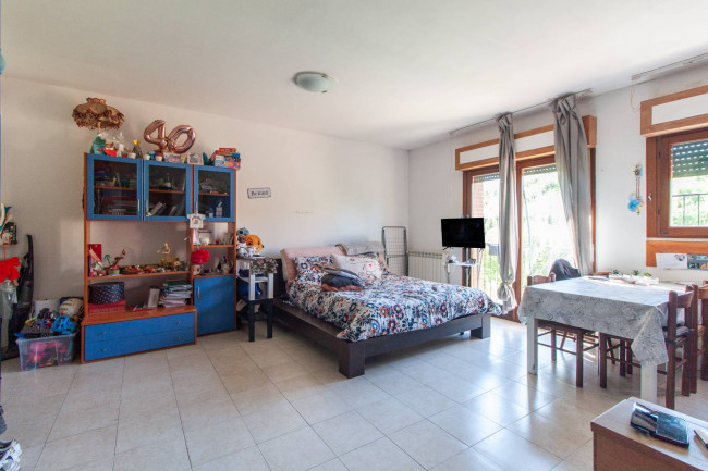 Ingrandisci la foto