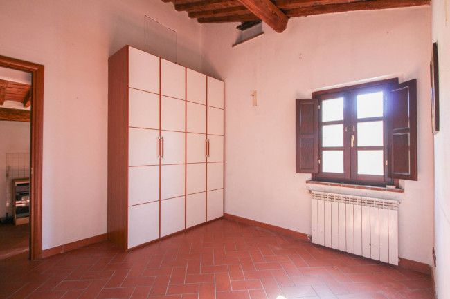 Ingrandisci la foto
