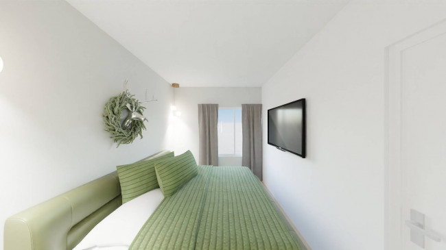 Moderne Dreizimmerwohnung mit großer Terrasse in Montan