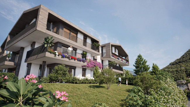 Moderne 3-Zimmer-Neubauwohnung mit großem Garten und Terrasse in Montan