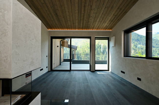 Exklusive 3-Zimmer-Attikawohnung mit Panoramaterrasse, Whirlpool und Blick auf den Latemar und den Rosengarten