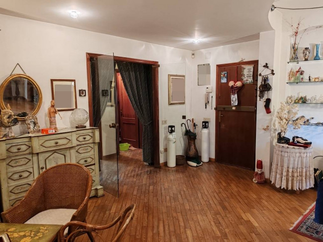 Ingrandisci la foto