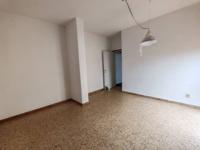 Ingrandisci la foto