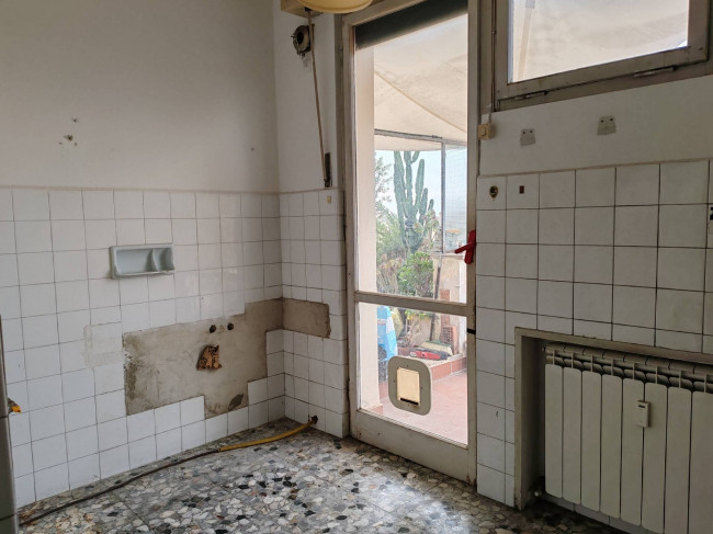 Ingrandisci la foto