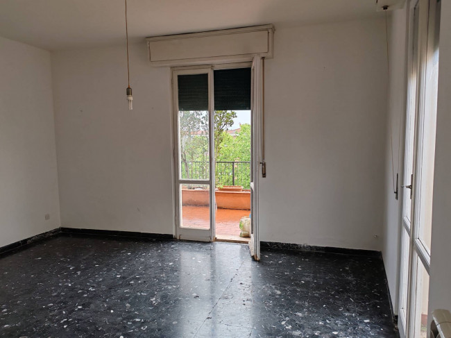 Ingrandisci la foto