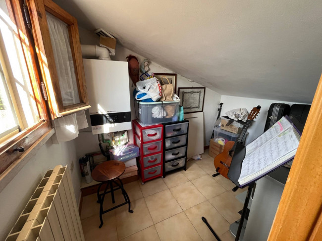 Ingrandisci la foto