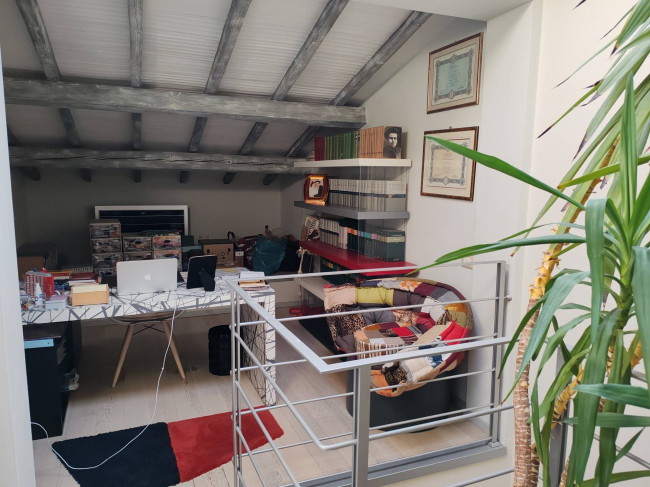 Ingrandisci la foto