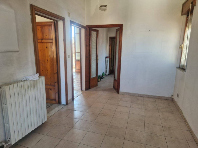 Ingrandisci la foto