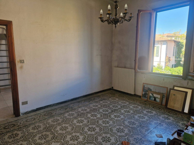 Ingrandisci la foto