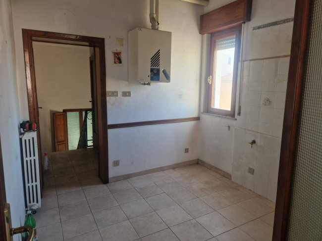 Ingrandisci la foto