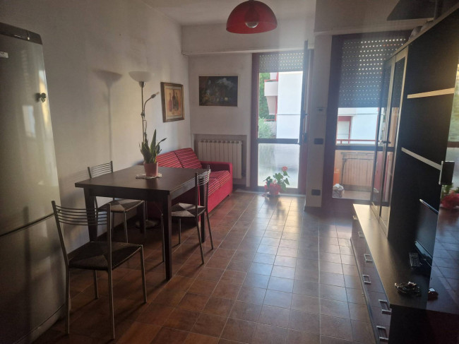 Ingrandisci la foto