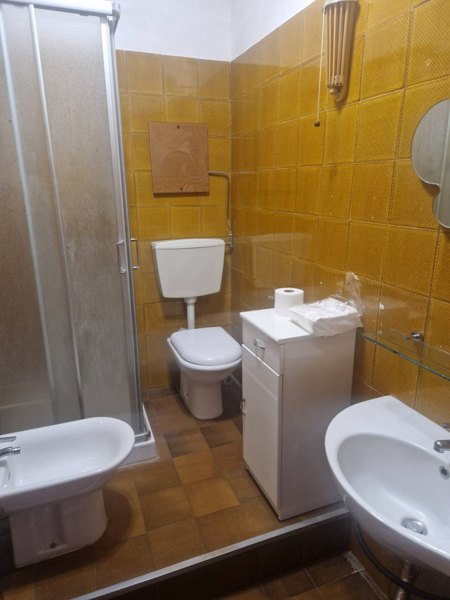 Ingrandisci la foto