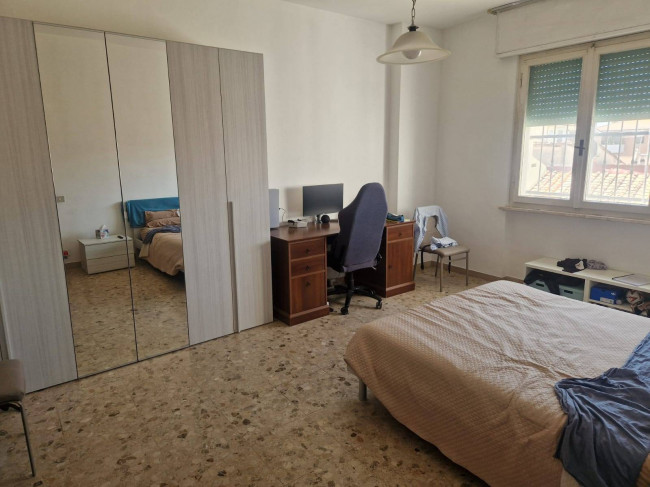 Ingrandisci la foto