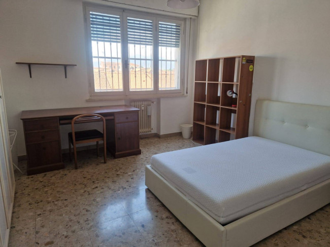 Ingrandisci la foto