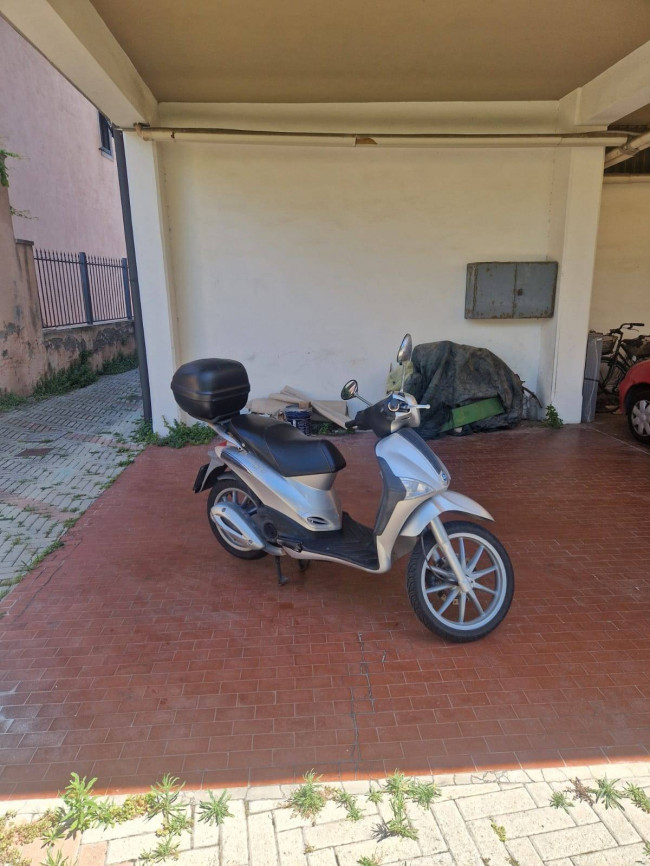 Ingrandisci la foto