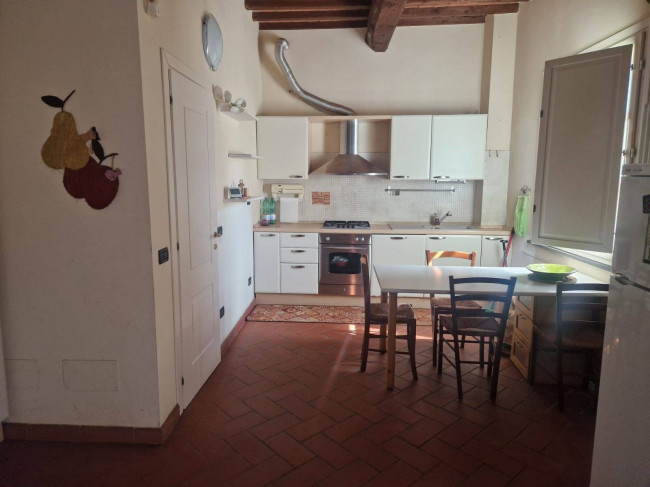 Ingrandisci la foto