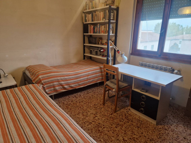 Ingrandisci la foto